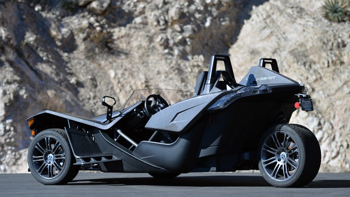 a motorcycle is parked on the side of a road