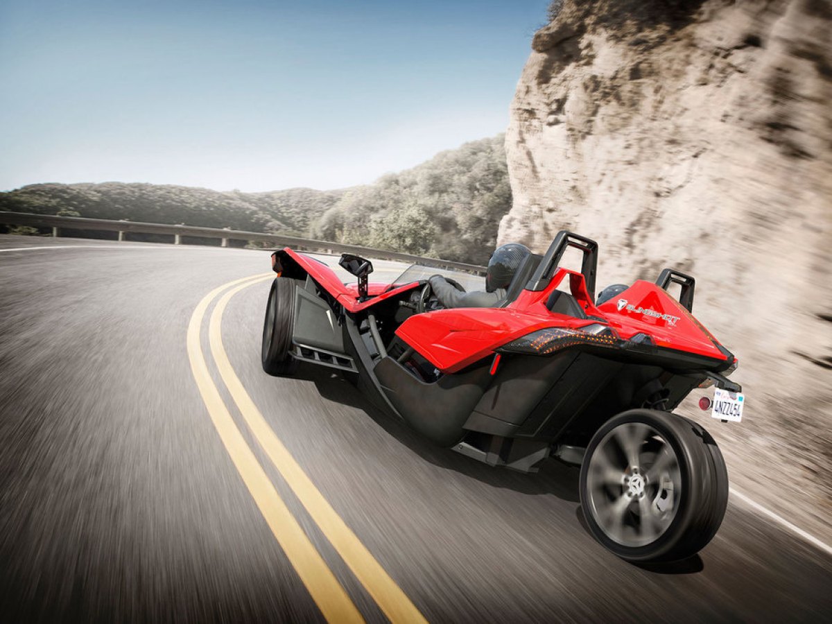 a motorcycle parked on the side of a road