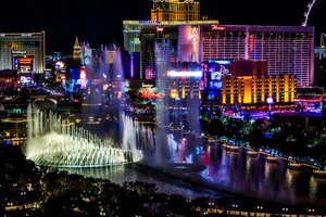 Adrenaline+Rush+Slingshot+Rentals+Las+Vegas a lit up city at night