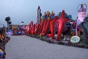 Neon+Boneyard+Las+Vegas+Adrenaline+Rush+Slingshot a group of people on a beach