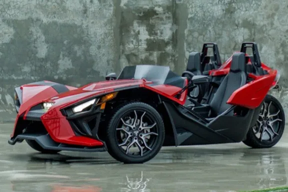 a motorcycle parked on the side of a road