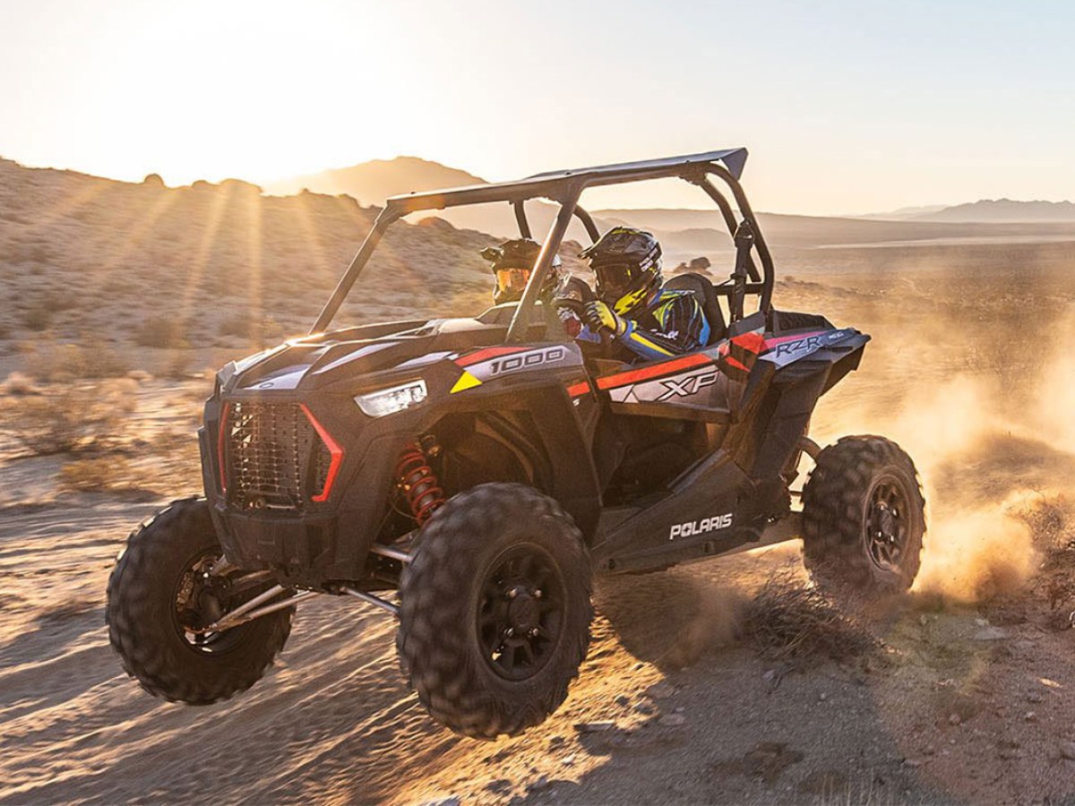 a tractor parked in the dirt